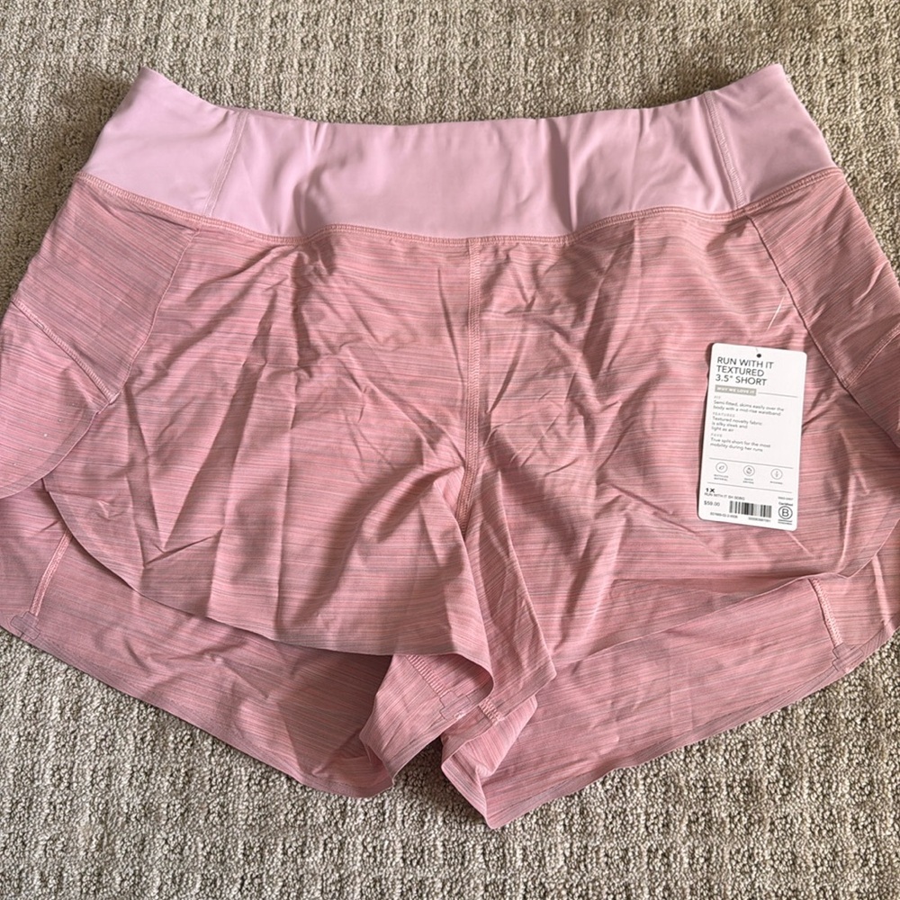 NWT Athleta run with it textured 3.5” shorts running shorts pink size 1X